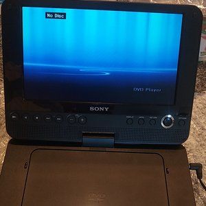 SONY DVP-FX820L Portable DVD Player and power supply.
